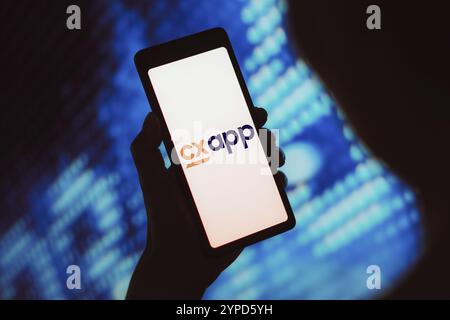 14 marzo 2024, Brasile. In questa immagine, il logo CXApp viene visualizzato sullo schermo di uno smartphone Foto Stock