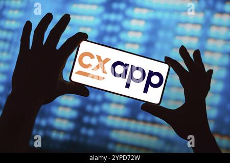 14 marzo 2024, Brasile. In questa immagine, il logo CXApp viene visualizzato sullo schermo di uno smartphone Foto Stock