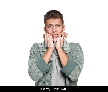 Studente emotivo che ha stress prima dell'esame su sfondo bianco Foto Stock