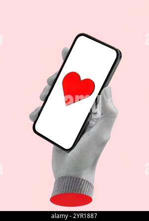 Connessione digitale simboleggiata da smartphone con icona a forma di cuore Foto Stock