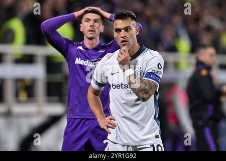 L'attaccante dell'Inter-FC Internazionale Lautaro Martinez e il difensore dell'ACF Fiorentina Robin Gosens reagiscono dopo il grave infortunio del centrocampista dell'ACF Fiorentina Edoardo Bove durante ACF Fiorentina vs Inter - FC Internazionale, partita di serie A A a Firenze, Italia, 1 dicembre 2024 Foto Stock