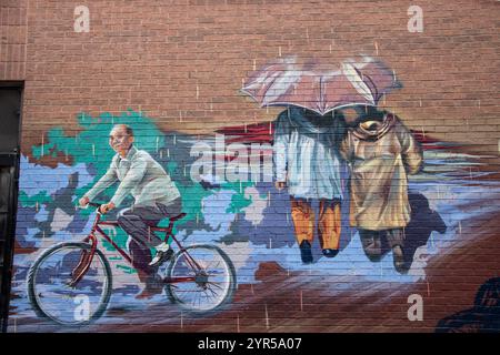 Murale che raffigura i primi anni di vita a Chinatown su Grange Place nel centro di Toronto, Ontario, Canada Foto Stock