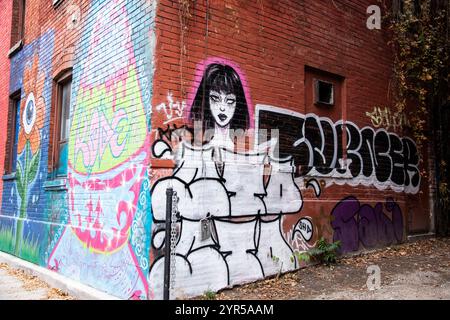 Bottiglia d'inchiostro e murale femminile in Renfrew Place nel centro di Toronto, Ontario, Canada Foto Stock