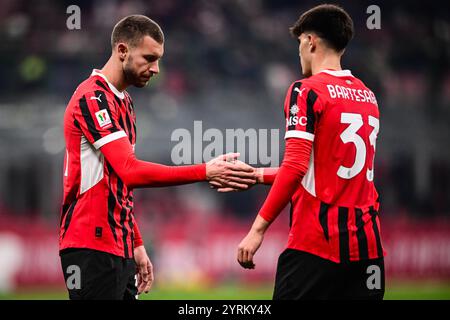 Strahinja PAVLOVIC dell'AC Milan e Davide BARTESAGHI dell'AC Milan durante la Coppa Italia, turno di 16 partite di calcio tra l'AC Milan e lo US Sassuolo il 3 dicembre 2024 allo stadio San Siro di Milano Foto Stock