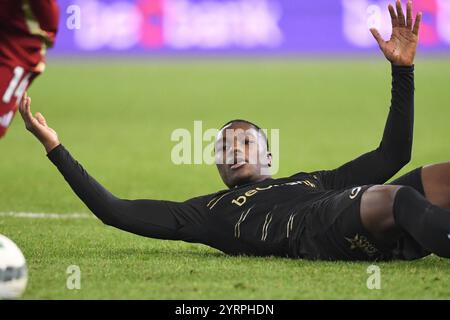 Genk, Belgio. 4 dicembre 2024. Ken Nkuba di Genk sembra sgretolato durante una partita di calcio tra il KRC Genk e lo Standard de Liege, mercoledì 04 dicembre 2024 a Genk, nella finale del campionato belga di calcio "Croky Cup" del 1/8. BELGA FOTO JILL DELSAUX credito: Belga News Agency/Alamy Live News Foto Stock