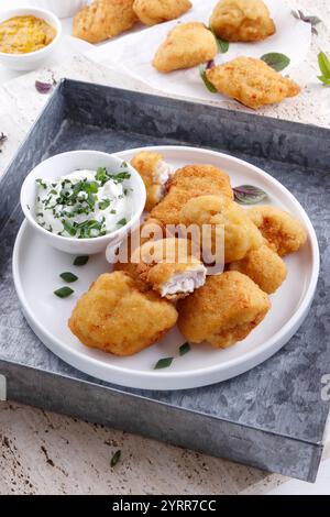 Pepite di pesce con tuffi Foto Stock