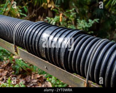 Connecting sleeve on plastic cable channel Foto Stock