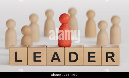 Concetto di leadership e team leader. Squadra di parole su blocco di legno, figura di legno in piedi su un blocco di legno con LEADER. Rapporto di collaborazione e. Foto Stock