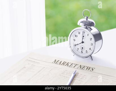 Sveglia e quotidiano sul davanzale Foto Stock