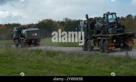 British Army MAN HX 25,440 6x6 BB (HX58) SV Unit Support Tanker Medium (Medium Mobility) 9 tonne in azione su un'esercitazione militare, Wilts UK Foto Stock