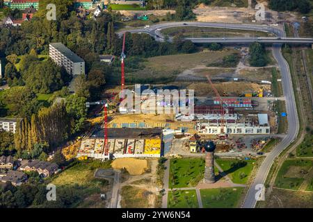 Vista aerea, cantiere con nuovo edificio nell'area residenziale di Dirschauer Straße con torre dell'acqua, quartiere residenziale progettato di Duisburg in t Foto Stock