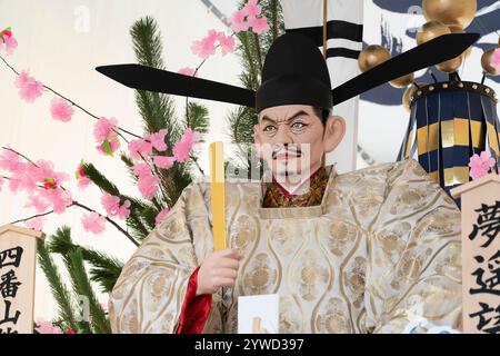 Hakata Gion Yamakasa, Fukuoka City, Kyushu, Giappone. Questo festival registrato come patrimonio immateriale dell'UNESCO vede gli uomini portare santuari portatili Foto Stock