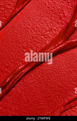 Texture rossetto rosso, sfondo texture cosmetica. Foto Stock