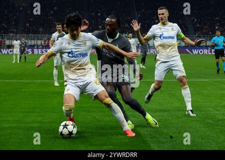 Milano, Italia. 11 dicembre 2024. Champions League, giorno 6, Stadio Giuseppe Meazza, Milano, Milano - Stella Rossa, nella foto: Young-Woo Seol e Abraham durante AC Milan vs FK Crvena Zvezda, partita di calcio della UEFA Champions League a Milano, Italia, 11 dicembre 2024 crediti: Agenzia fotografica indipendente/Alamy Live News Foto Stock