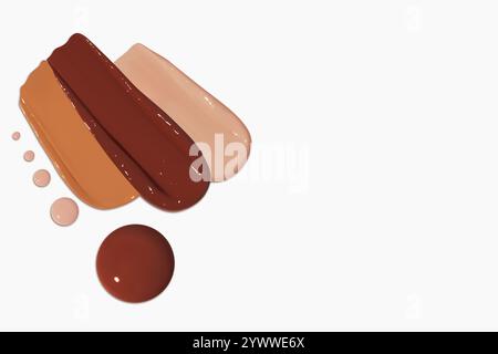 Composizione di strisci e gocce di fondamento liquido in varie tonalità, tra cui toni chiari e scuri, isolati su uno sfondo chiaro. Foto Stock