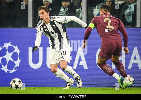 Torino, Italie. 11 dicembre 2024. Kenan YILDIZ della Juventus e Kyle WALKER del Manchester City durante la partita di calcio UEFA Champions League, fase MD6 tra Juventus FC e Manchester City FC l'11 dicembre 2024 all'Allianz Stadium di Torino, Italia - foto Matthieu Mirville (A Gandolfo)/DPPI Credit: DPPI Media/Alamy Live News Foto Stock