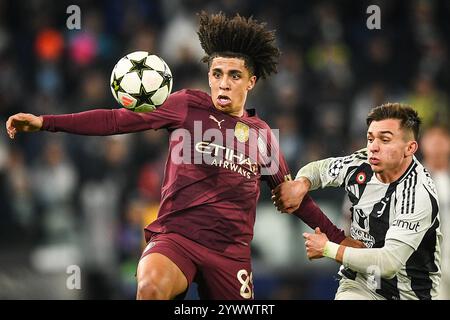 Torino, Italia, Italia. 11 dicembre 2024. Rico LEWIS del Manchester City e Francisco CONCEICAO della Juventus durante la partita di UEFA Champions League, fase MD6 tra Juventus FC e Manchester City all'Allianz Stadium l'11 dicembre 2024 a Torino. (Credit Image: © Matthieu Mirville/ZUMA Press Wire) SOLO PER USO EDITORIALE! Non per USO commerciale! Foto Stock