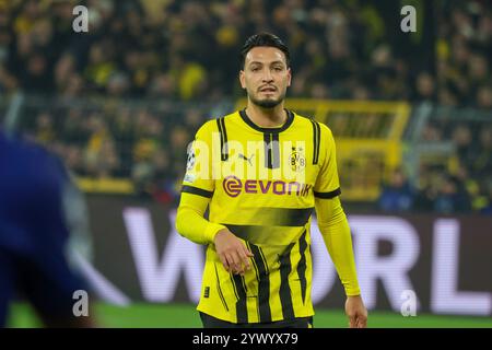 Dortmund, Germania. 11 dicembre 2024. Dortmund, Germania 11. Dezember 2024: Champions League - 2024/2025 - Borussia Dortmund vs. FC Barcelona IM Bild: Ramy Bensebaini (BVB) crediti: dpa/Alamy Live News Foto Stock