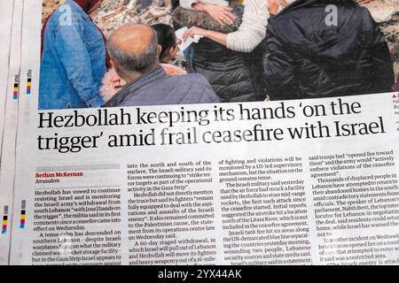 "Hezbollah tenere le mani "sul grilletto" in mezzo a un fragile cessate il fuoco con Israele" testata del quotidiano The Guardian in Medio Oriente articolo UK 29 novembre 2024 Foto Stock