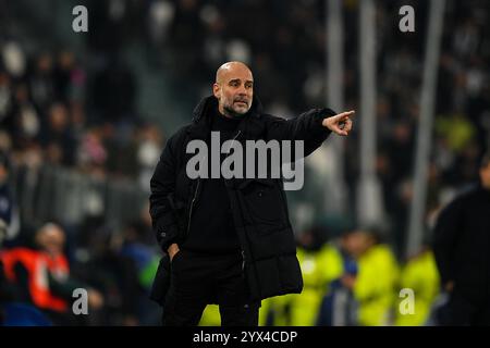 Il capo-allenatore del Manchester City Pep Guardiola durante la fase MD6 della UEFA Champions League 2024/25 tra la Juventus FC e il Manchester City FC Foto Stock