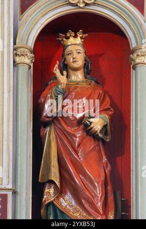 Santa Caterina d'Alessandria, statua sull'altare di nostra Signora dei poveri nella chiesa parrocchiale della Santa Trinità a Rovisce, Croazia Foto Stock