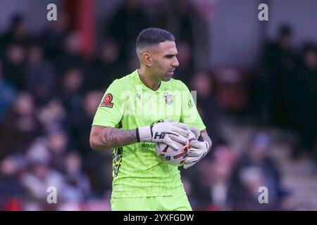 Tamworth, Regno Unito, 14 dicembre 2024. Jasbir Singh, portiere di Tamworth durante la partita della National League tra Tamworth e York City. (Crediti: Gustav Foto Stock