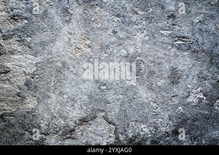 Trama astratta di un muro di pavimentazione con motivi dettagliati e sottili variazioni di colore Foto Stock