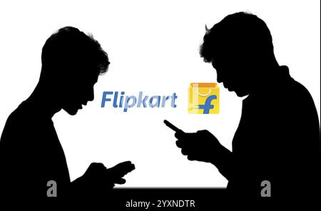 Applicazione Flipkart su smartphone con sfondo laptop Foto Stock