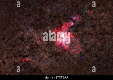 La grande Nebulosa carina e la nebulosità scura nella costellazione carina. Foto Stock