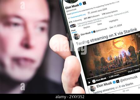 Poltava, Ucraina - 17 dicembre 2024. Pagina del profilo Twitter di Elon Musk con un nuovo tweet su uno smartphone in mano Foto Stock