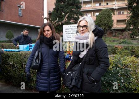 Torino, Italia. 18 dicembre 2024. Clarissa Vetri e Roberta Varotti, mogli degli operai morti, partecipano alla cerimonia in ricordo delle tre vittime per il crollo della gru in via Genova nel terzo anniversario della tragedia. Torino, Italia - Marted&#xec;, 18 dicembre 2024 - Cronaca - foto Andrea Alfano/LaPresse Clarissa Vetri e Roberta Varotti, mogli di mortai morti, prendono parte alla cerimonia ricordando tre vittime per il crollo di via Genova gru nel terzo anniversario della tragedia. Torino, Italia - mercoledì 18 dicembre 2024 - News - Andrea Alfano/LaPresse credito: LaPresse/Alamy Live News Foto Stock