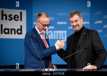 Friedrich Merz, Markus Soeder - Wahlprogramm DEU, Deutschland, Germania, Berlino, 17.12.2024 Friedrich Merz , Vorsitzender der CDU und Fraktionsvorsitzender , und Markus Soeder , Vorsitzender der CSU und Ministerpraesident in Bayern rechts waehrend der Pressekonferenz zur Vorstellung vom Wahlprogramm der CDU/CSU/CSU Nach dem Scheitern der Regierungskoalition im November und dem Misstrauensvotum werden in Deutschland AM 23. February vorgezogene Wahlen abgehalten en: Friedrich Merz , presidente della CDU e capo del gruppo parlamentare Foto Stock