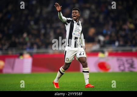 Milano, Italia. 19 dicembre 2024. Christian Kabasele dell'Udinese calcio gesta durante la partita di Coppa Italia tra FC Internazionale e Udinese calcio. Crediti: Nicolò campo/Alamy Live News Foto Stock