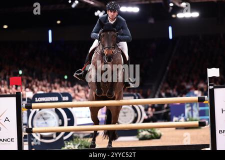 Londra, Regno Unito. 20 dicembre 2024. Steve Guerdat della Svizzera con Lancelotta durante il Gran Premio di Londra al London International Horse Show il 20 dicembre 2024, Londra, Regno Unito (foto di Maxime David - MXIMD Pictures) crediti: MXIMD Pictures/Alamy Live News Foto Stock