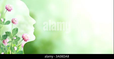 Striscione orizzontale con profilo umano in fiori di trifoglio. Sviluppo sostenibile di un approccio strategico a zero rifiuti, consumo responsabile. Reus Foto Stock