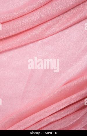 Sfondo in tessuto rosa con fili lurex e onde lucenti Foto Stock