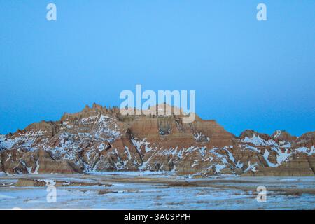 Dusk falling over the Badlands Foto Stock