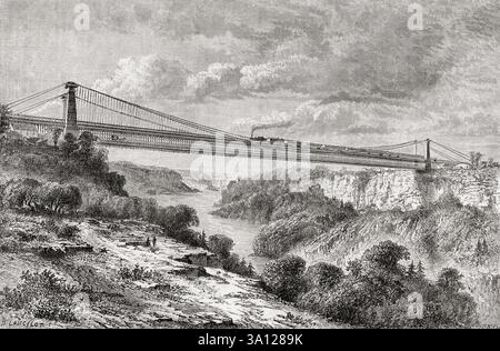 Il ponte sospeso delle Cascate del Niagara sul fiume Niagra. Tra il 1855 -1897 è stato il primo ponte sospeso ferroviario funzionante al mondo. Da Voyage dans l'Amerique Septentrionale di M.L. Deville, Etats-Unis et Canada, 1854 - 1855 o viaggio in Nord America di M.L. Deville, Stati Uniti e Canada, 1854 - 1855. Apparso in le Tour du Monde, pubblicato nel 1861. Foto Stock