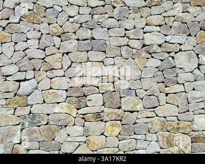 vecchia pietra parete texture come sfondo piacevole Foto Stock