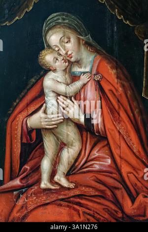 Villeneuve sur Yonne, FRANCIA - 01-28-2025: Pittura (XVIII secolo) della Beata Vergine Maria che tiene in braccio il bambino Foto Stock