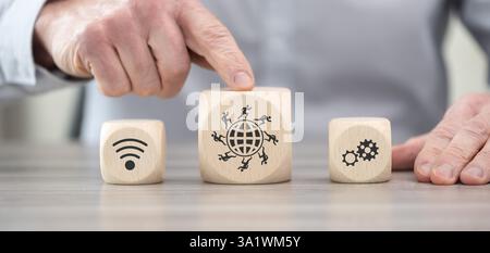 Blocchi di legno con simbolo del concetto di globalizzazione Foto Stock