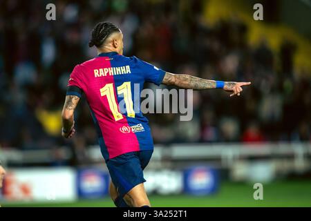 Barcellona, Spagna. 11 marzo 2025. Raphinha di Barcellona celebra il suo gol durante la partita di calcio di 2a tappa della UEFA Champions League tra FC Barcelona e SL Benfica a Barcellona, in Spagna, l'11 marzo 2025. Crediti: Joan Gosa/Xinhua/Alamy Live News Foto Stock