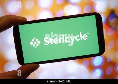 Polonia. 11 marzo 2025. In questa immagine, il logo della società Stericycle Inc viene visualizzato sullo schermo di uno smartphone. (Credit Image: © Piotr Swat/SOPA Images via ZUMA Press Wire) SOLO PER USO EDITORIALE! Non per USO commerciale! Foto Stock