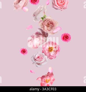 Bellissimi fiori freschi che cadono su sfondo rosa pastello Foto Stock