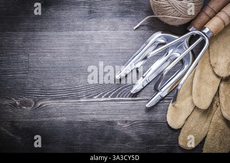 Guanti in pelle per rastrello a forchetta hank of Rope Agriculture Concept Foto Stock