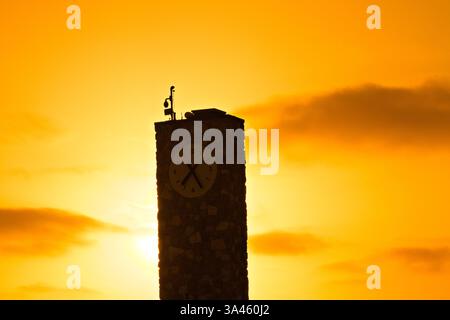Torre dell'orologio al tramonto Foto Stock