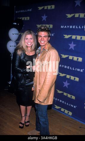 24 settembre 1999; Los Angeles, CA, Stati Uniti; gli attori DANIELLE FISHEL e MATTHEW LAWRENCE @ The Rising Star/Habitat for Humanity Benefit. Foto Stock