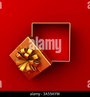 Vista dall'alto della confezione regalo in oro legata a un arco a nastro dorato o a una confezione regalo in oro vuota, isolata su sfondo rosso scuro con ombra concettuale minimalista Foto Stock