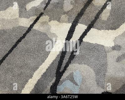 Design casuale con motivo astratto tappeto trapuntato a mano, in bianco, grigio e nero. Schizzi astratti casuali e pattern di tratti casuali. Foto Stock