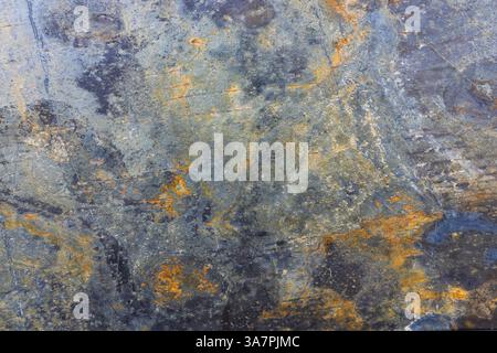 Texture decorativa per piastrelle di roccia con dettagli superficiali ruvidi e lucidati Foto Stock